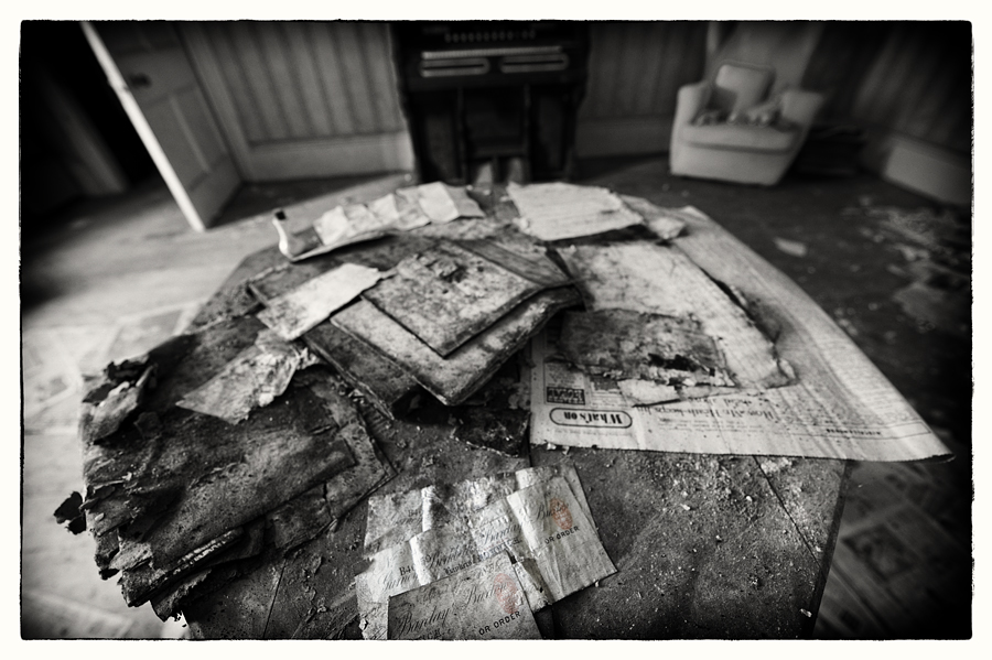 Documents on a table in abandoned Manor House B