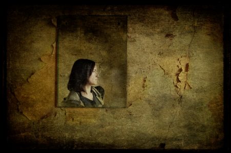 Self portrait in mirror reflection, derelict asylum