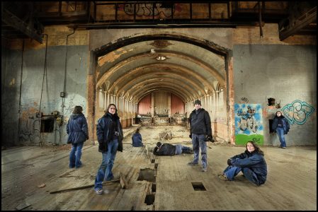 Multiplicity portrait on the stage in the hall, with street art, derelict Hellingly Asylum, West Sussex
