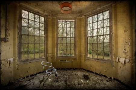 Commode chair in bay window, derelict West Park Asylum, Epsom, Surrey