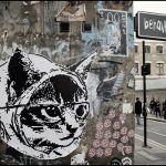 Street art in East London, cat face in paper