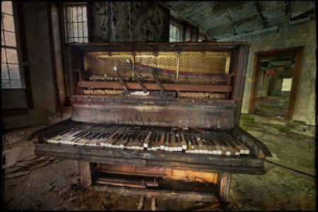 Old piano, texture overlay, derelict Talgarth Asylum, Wales, UK