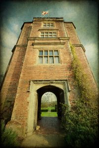 Tower with flag at Sissinghurst Castle, Kent. National Trust property.